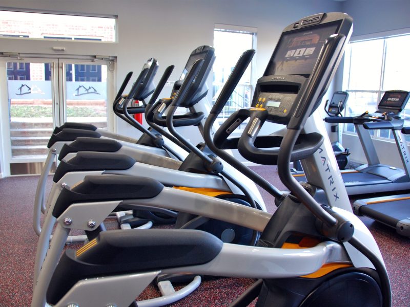 This image shows TGM Ridge fitness gym equipment featuring the standard treadmill machine. It is a great way to burn calories and help with weight loss because they simulate a real-life movement.
