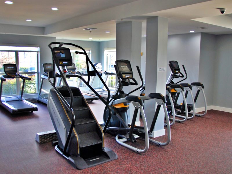 This image shows TGM Ridge fitness gym equipment featuring the standard Stair Climber Machine. It provides a great cardio workout that's easy on your joints but at the same time builds pretty much every muscle in your legs and bum due to it being a weight-bearing exercise.