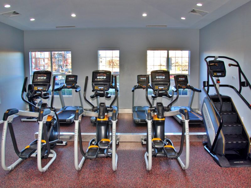 This image shows TGM Ridge fitness gym equipment featuring the standard Elliptical Stepper. It offers the benefit of a low-impact workout while exercising both your upper and lower body.